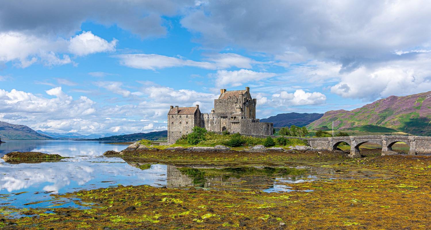 Isle of Skye, Glencoe & Eilean Donan Castle Small-Group Tour – mist-covered mountains and dramatic Scottish landscapes